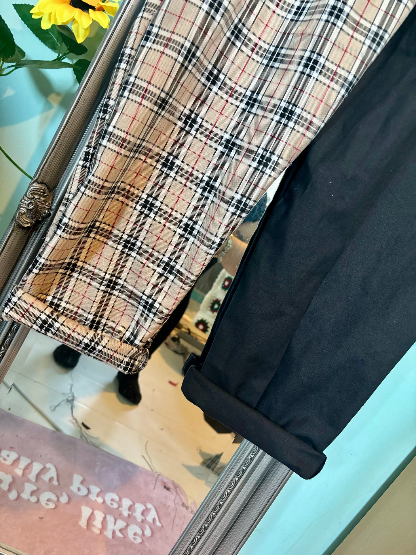Miss matched caramel tartan and black tapered leg trousers