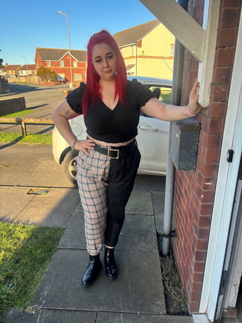 Miss matched caramel tartan and black tapered leg trousers