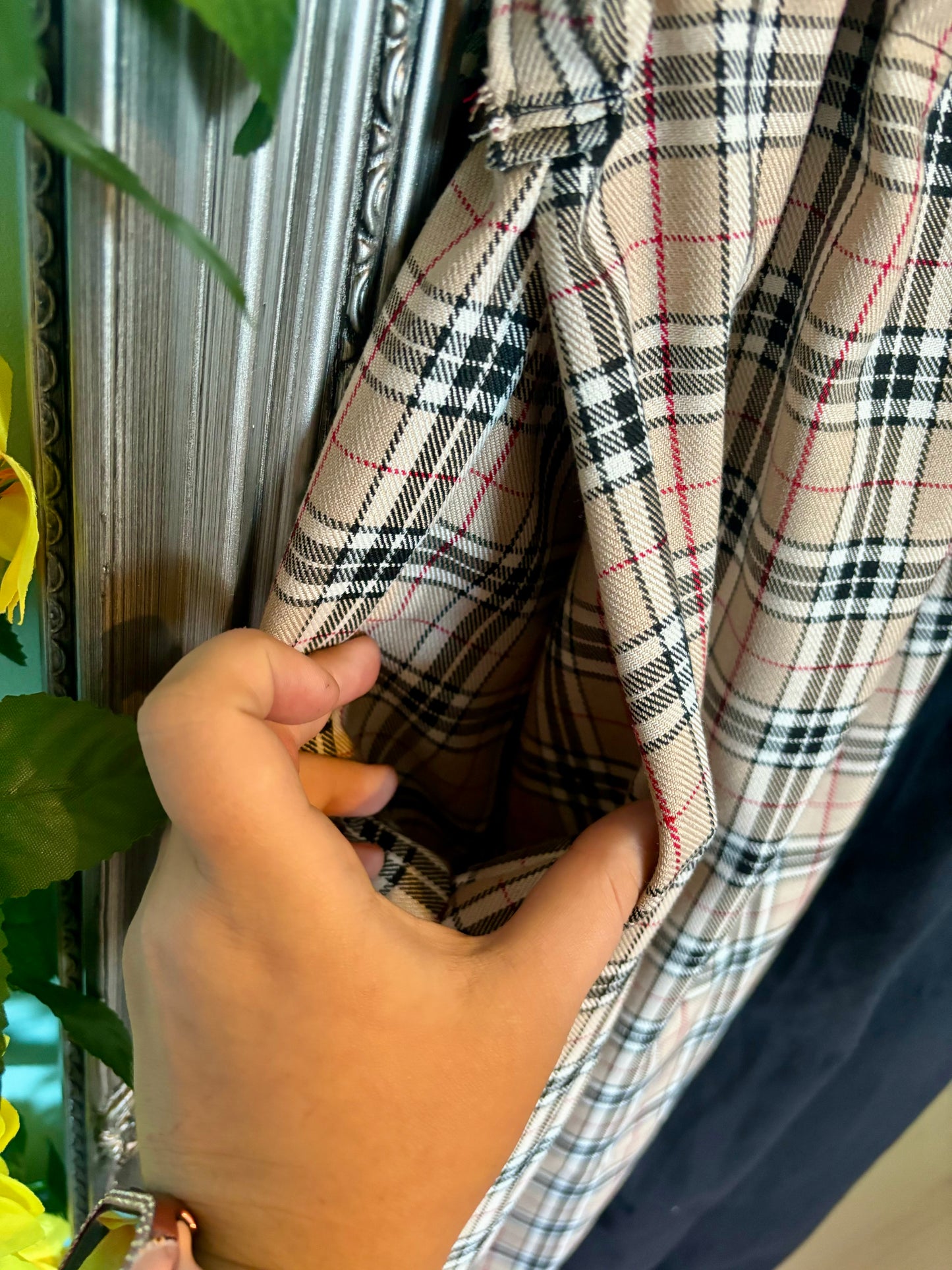 Miss matched caramel tartan and black tapered leg trousers