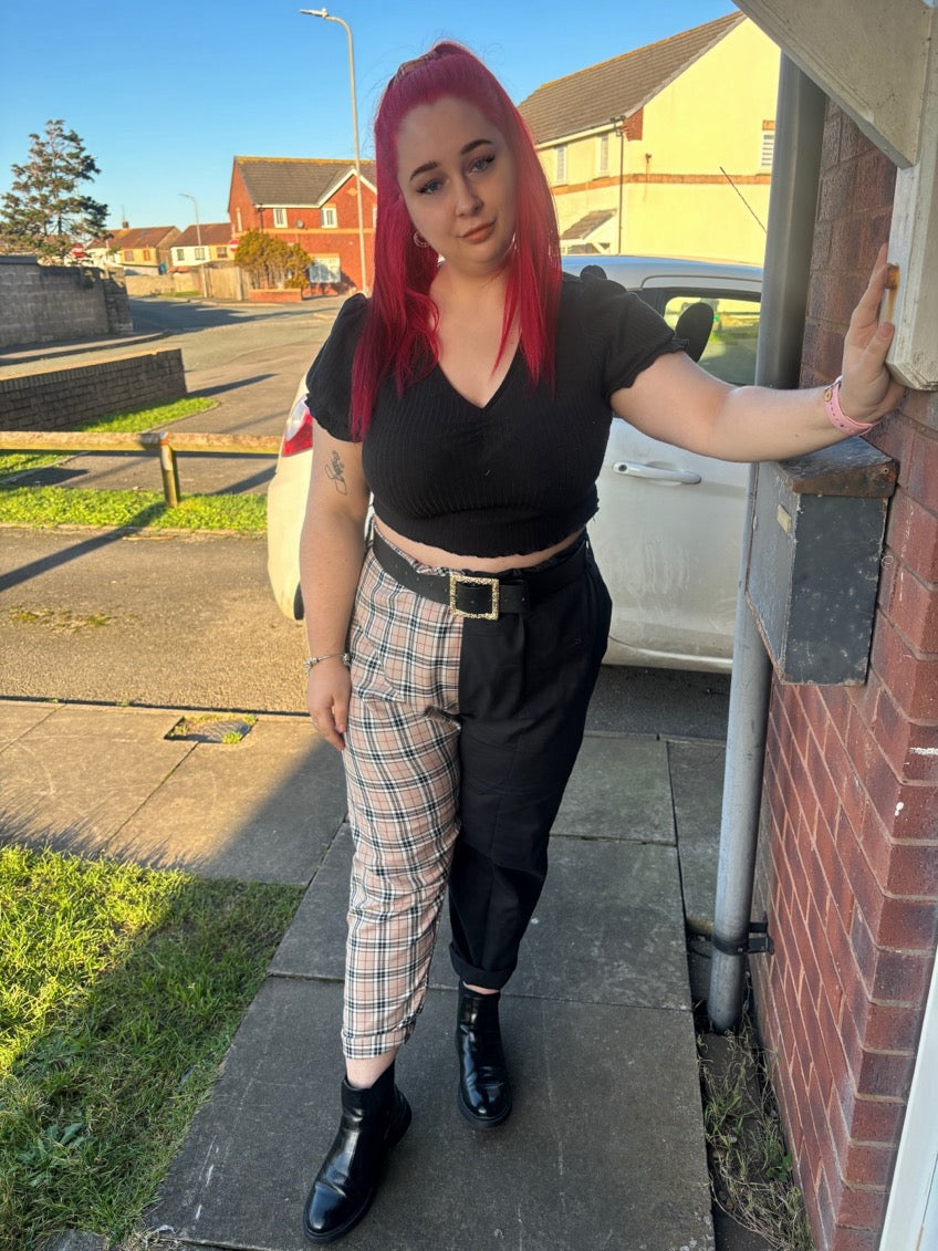 Miss matched caramel tartan and black tapered leg trousers