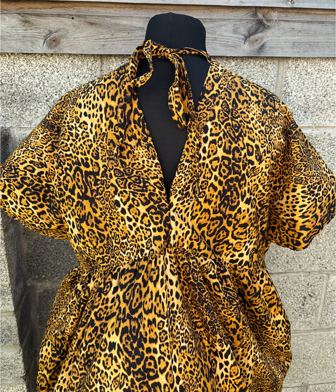 The Smocket Dress - Leopard print fabric / mismatched black pockets