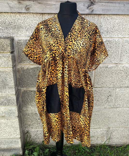 The Smocket Dress - Leopard print fabric / mismatched black pockets